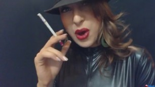 Smoking 120's in leather after putting on bright red lipstick AGENTSEXYHOT