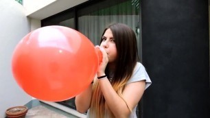 Ute Looner Girl Blowing up a Nice Red Balloon until it Pops, Blow to Pop