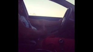 Black dude jacking off in his car
